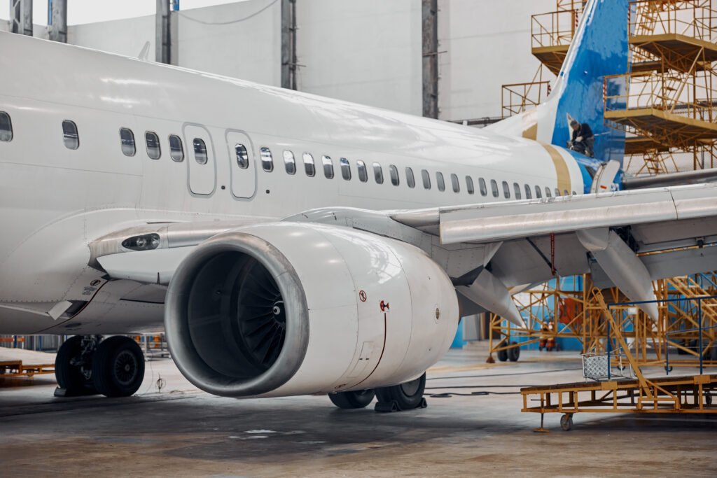Professional plane expluatation service in big hangar